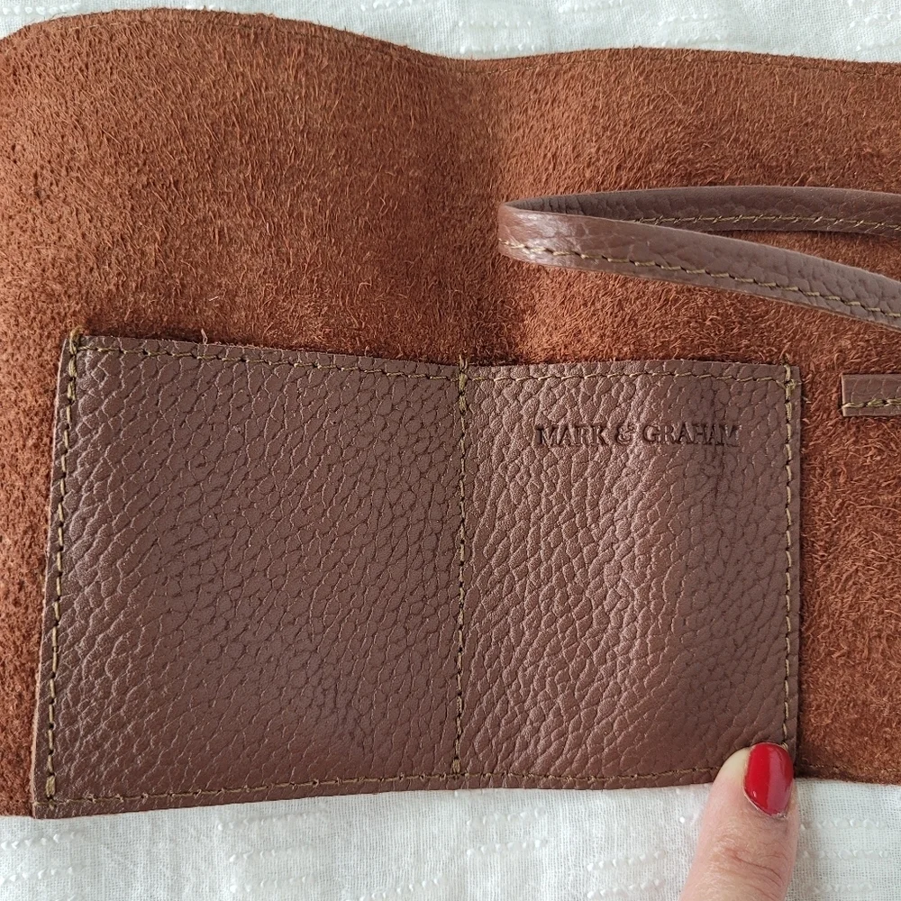 Mark & Graham brown pebbled leather charger rollup pockets tie closure minimal